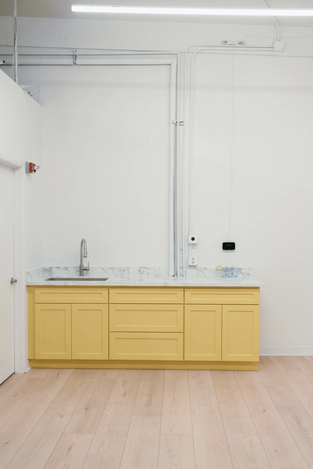 The kitchen corner with sink and counter at Lemur Lulu private party venue near Seattle
